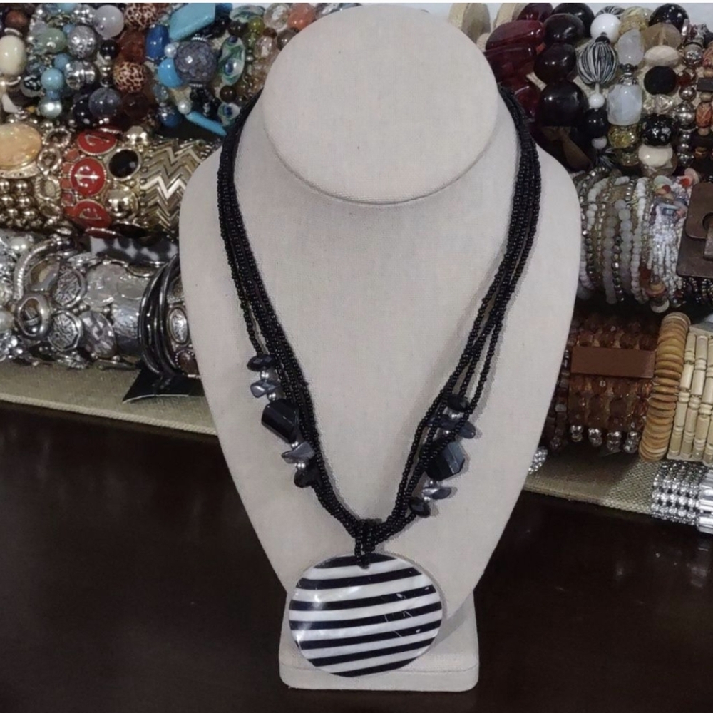 Multi Strand Black Seed Bead and Faceted Beaded Shell Pendant Necklace